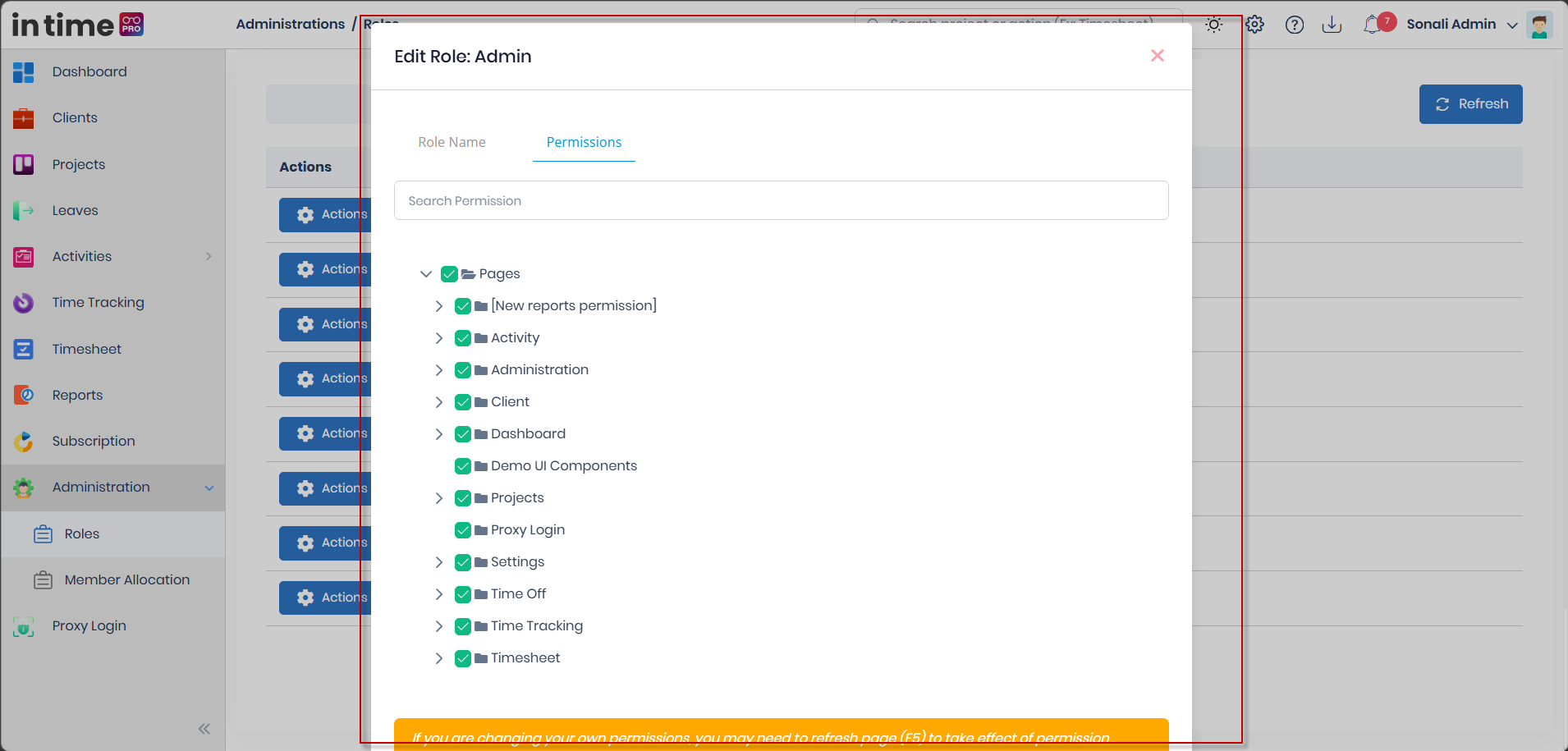 Permissions tab of the Edit Role dialog, with the Pages permission tree expanded to show categories such as Administration, Client, Dashboard, Projects, Settings, Time Off, Time Tracking, and Timesheet